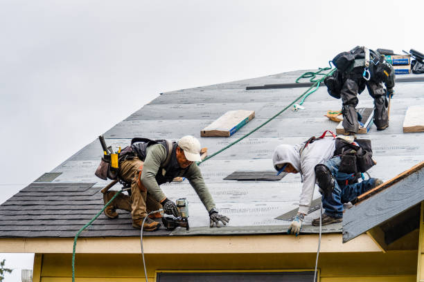 Professional Gutter Installation technician working in Hauppauge, NY